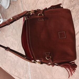 Brown Dooney & Bourke With Gold Hardware And Cute Tassels